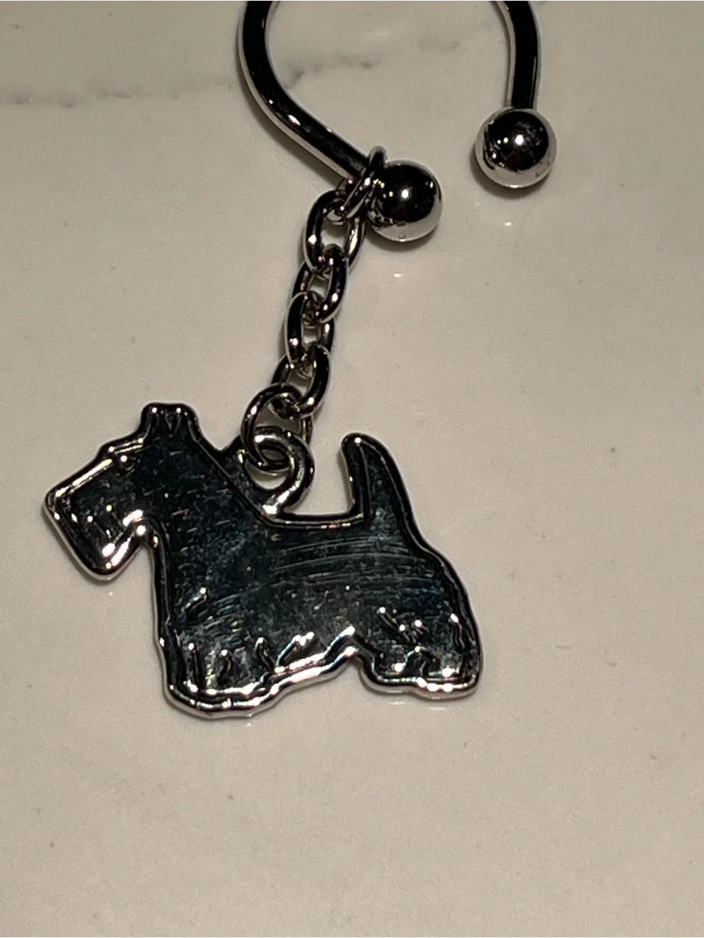 Great silver tone Scottish terrier dog keychain.  Approx 2.5” long.
